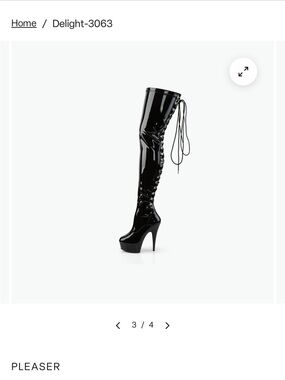 Black, laced up thigh, high pleaser boots. Size 5